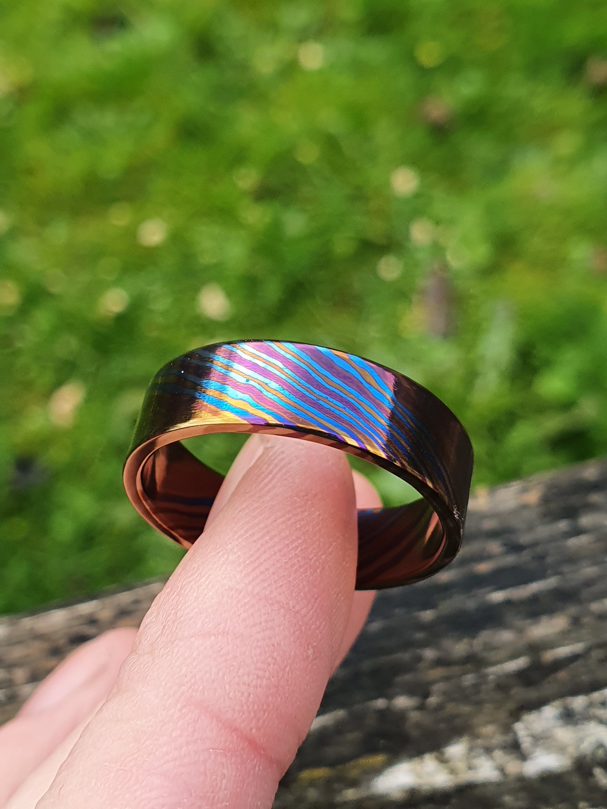 timascus ring in hand