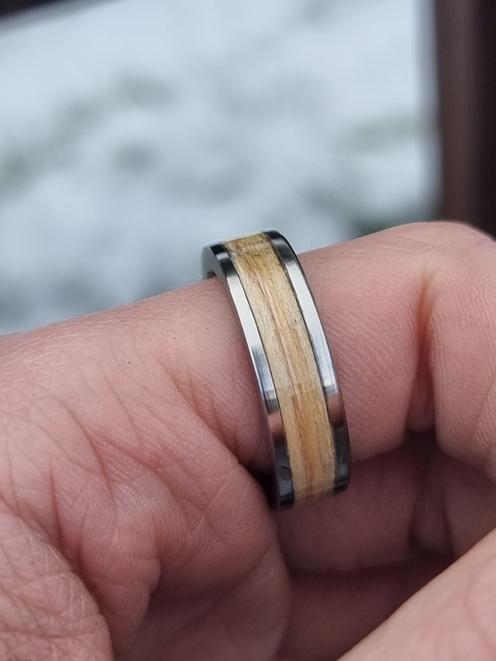 oak ring on finger
